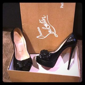 Christian Louboutin snakeskin pumps